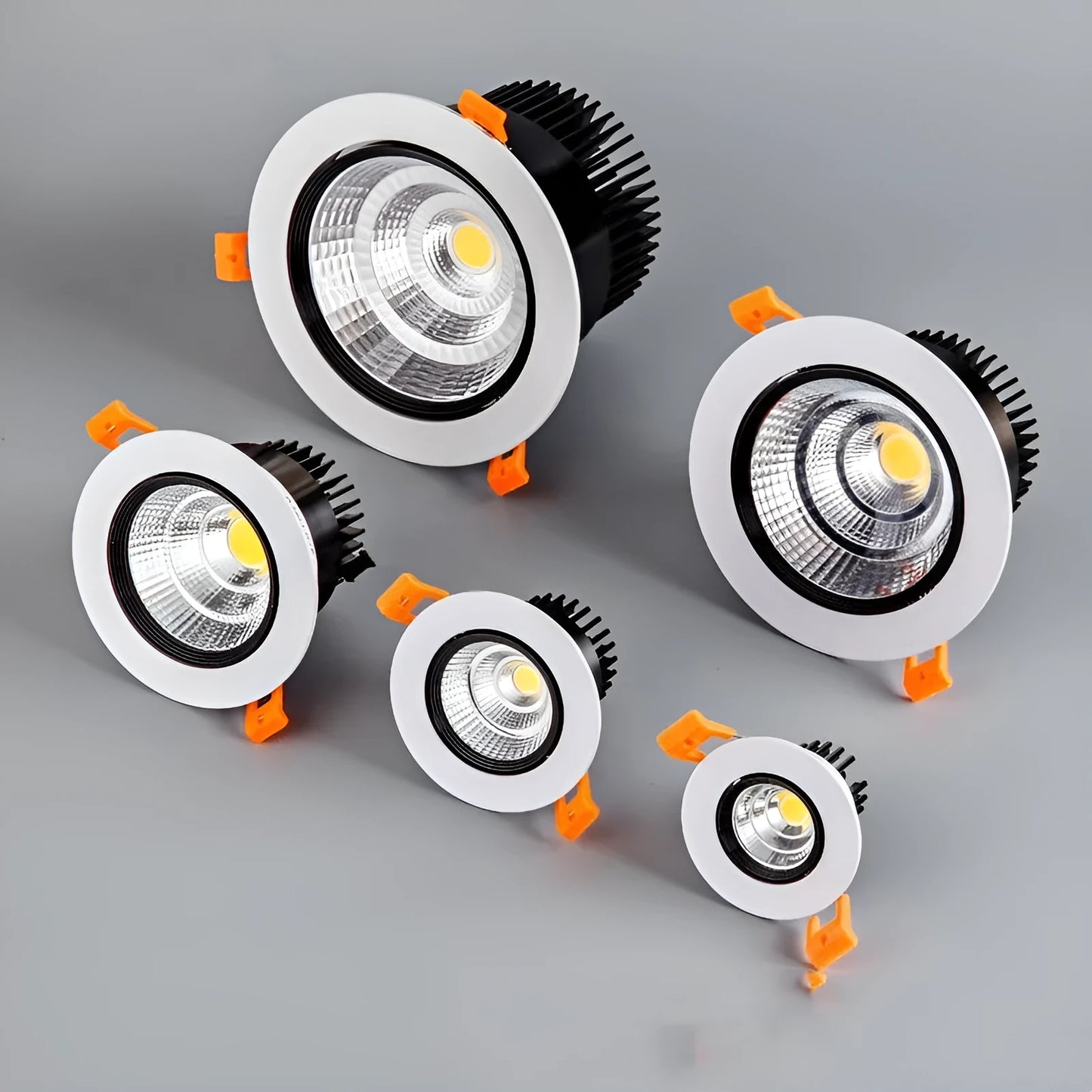 Modern aluminium recessed LED ceiling spotlight with three colour temperature settings shown installed.