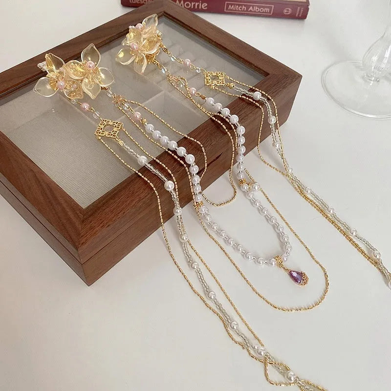 Women's hairpin featuring acrylic tassel design with pearl and diamond accents in a grip-gold colour, designed for fashion OL style and suitable for women's hairstyling