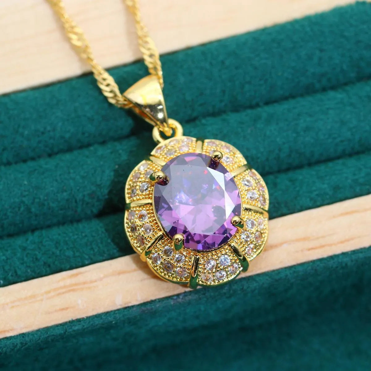 18k gold plated jewellery set with multi-colour zircon stones showing necklace, earrings, ring, and bracelet