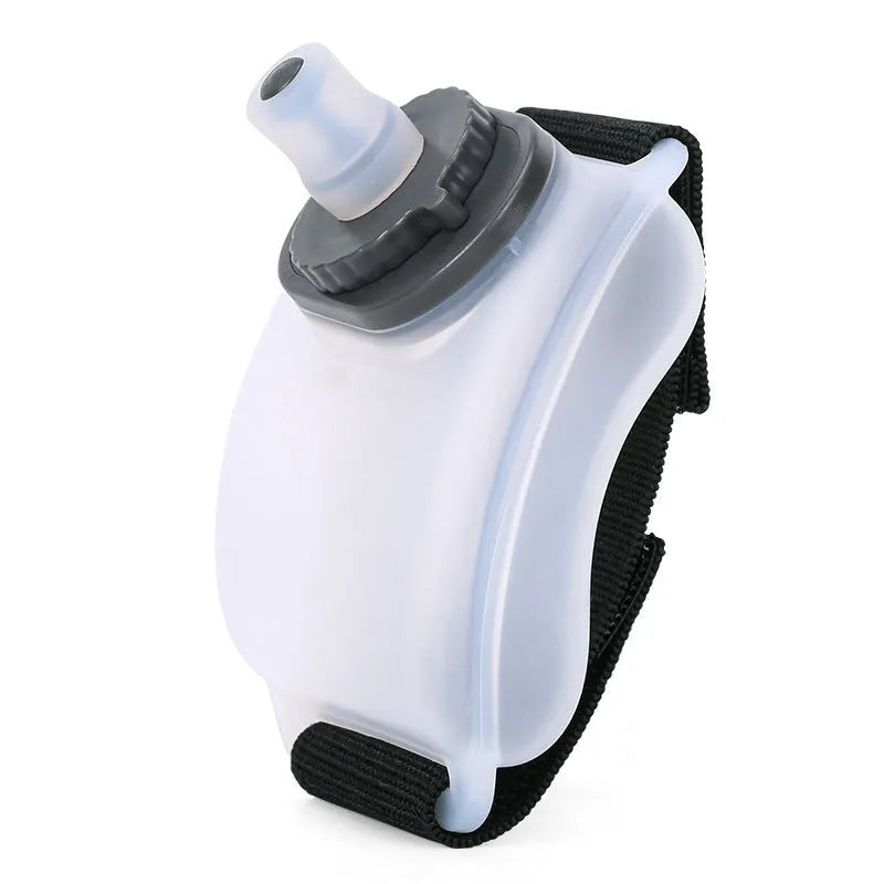 Orange wrist water bottle with Velcro strap showing 200ml capacity and silicone mouthpiece