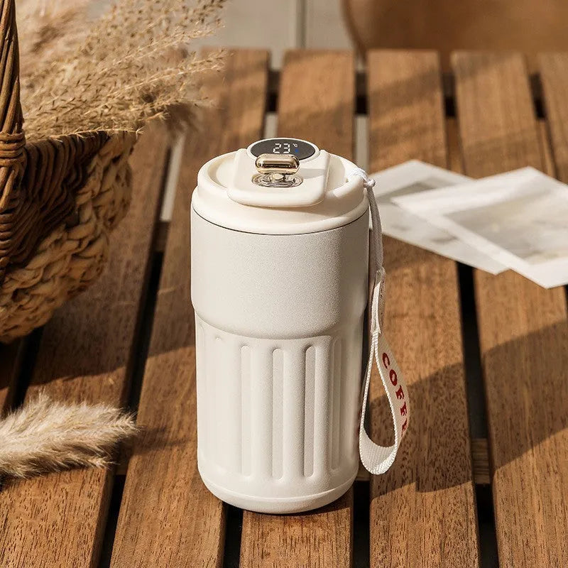 Digital thermal insulated bottle with temperature display and handle, stainless steel construction, 450ml capacity