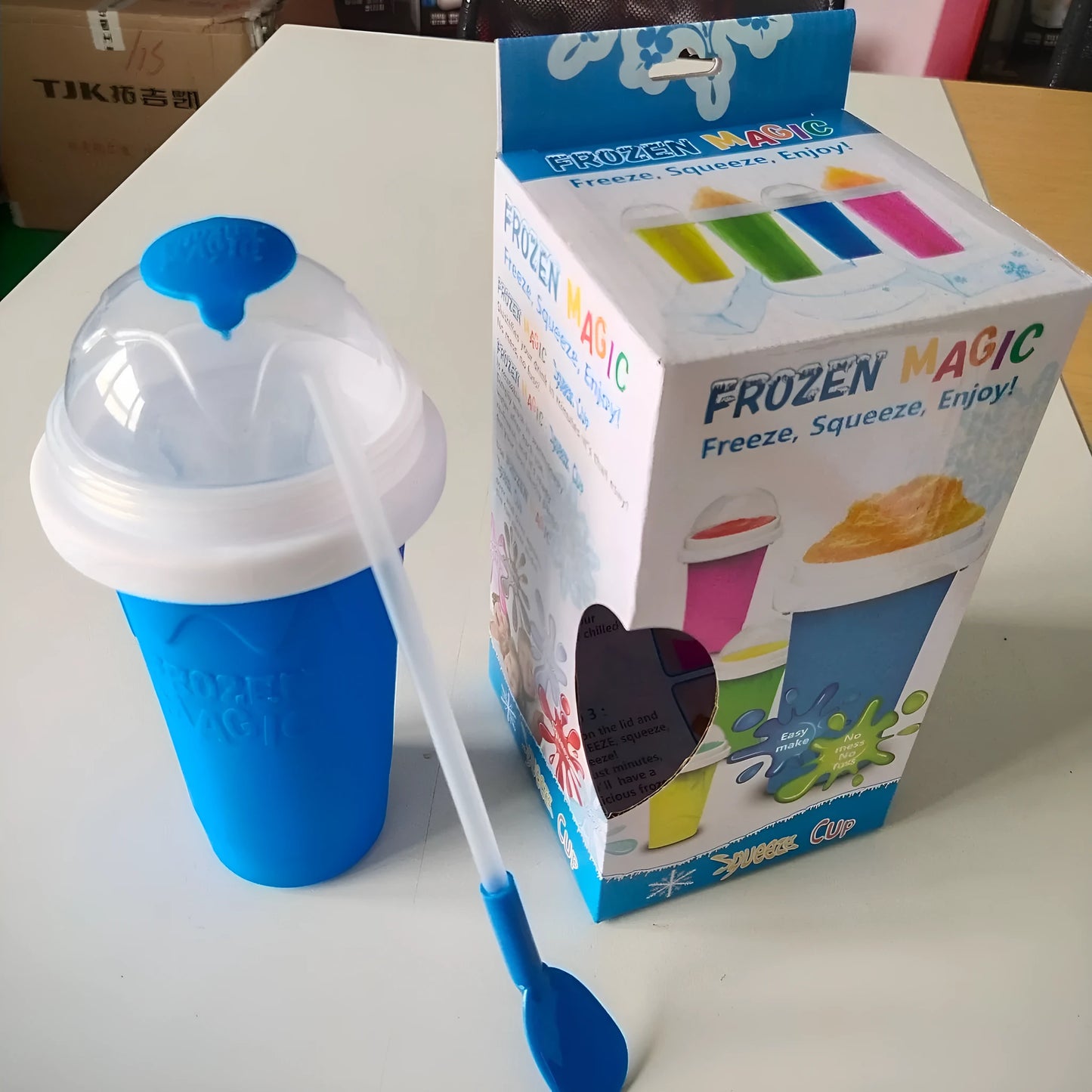 Blue silicone pinch cup showing double-layer construction for beverage cooling