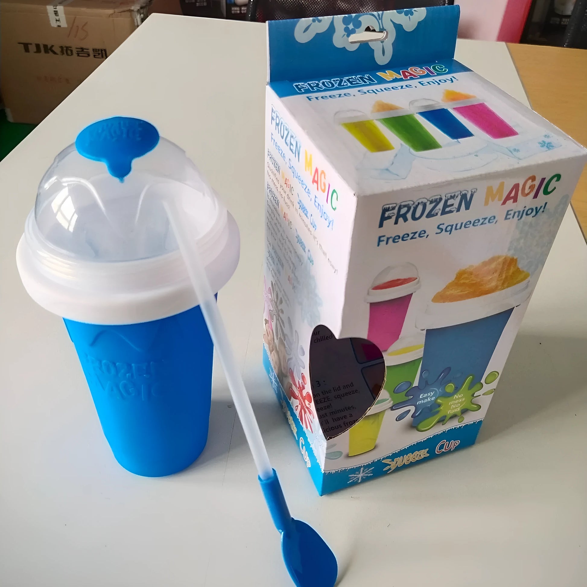 Blue silicone pinch cup showing double-layer construction for beverage cooling