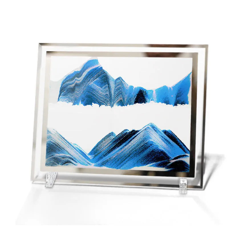 Geometric glass ornament containing a colourful quicksand landscape painting in modern style.