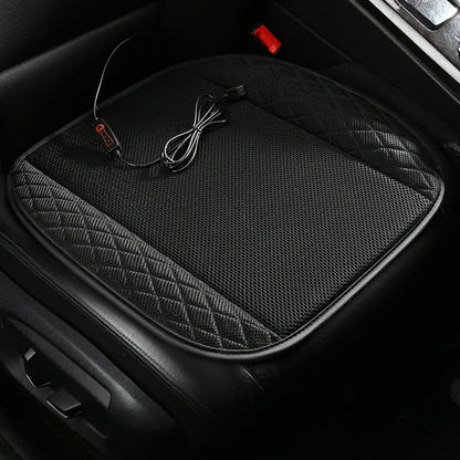 USB ventilated car seat cushion in black suede with visible fan vents, placed on a car seat.