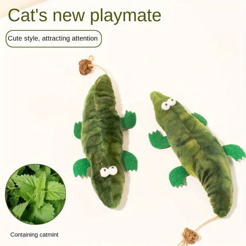 Green fabric plush alligator cat toy with catnip and peppermint scent for oral care.