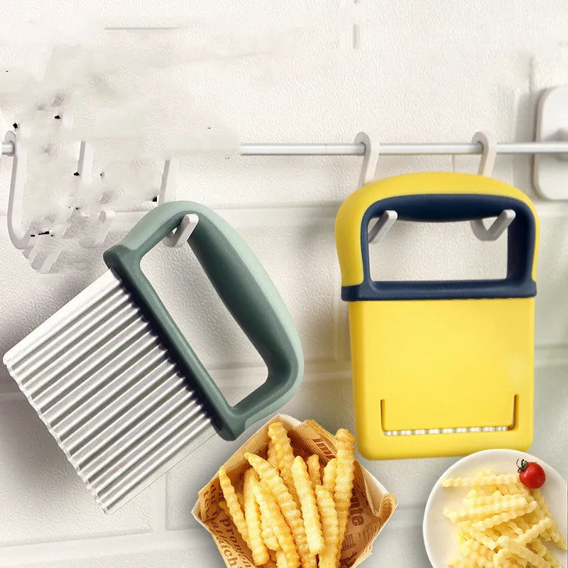 Stainless steel potato dicing tool with wolf tooth knife edge on yellow packaging