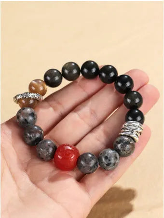Golden obsidian flame stone red agate unisex bracelet with original design.