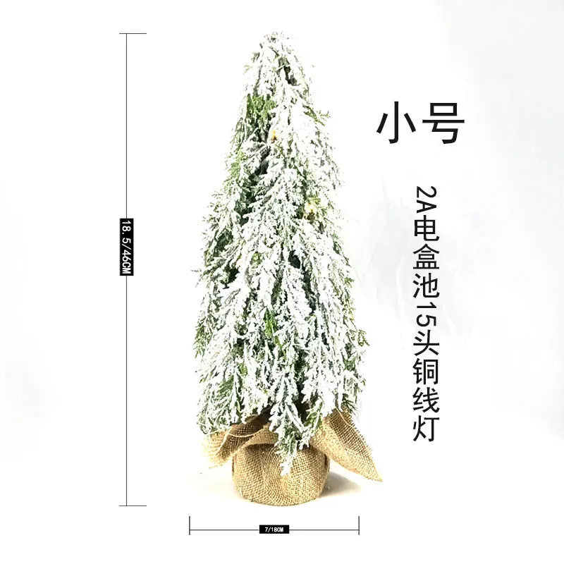 24-inch desktop Christmas tree with PE snow sprayer texture and built-in lights on plastic branches