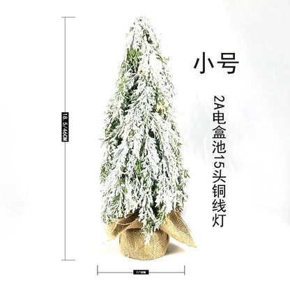 24-inch desktop Christmas tree with PE snow sprayer texture and built-in lights on plastic branches