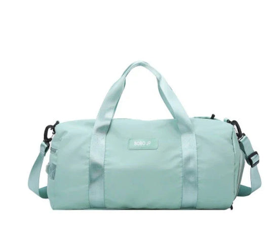 Premium, durable, and waterproof gym bag with multiple compartments and adjustable straps for organized fitness and travel