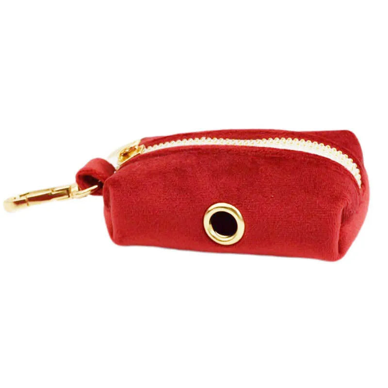 Cloth dog collar set with matching leash, bow tie, vest, and poop bag accessories