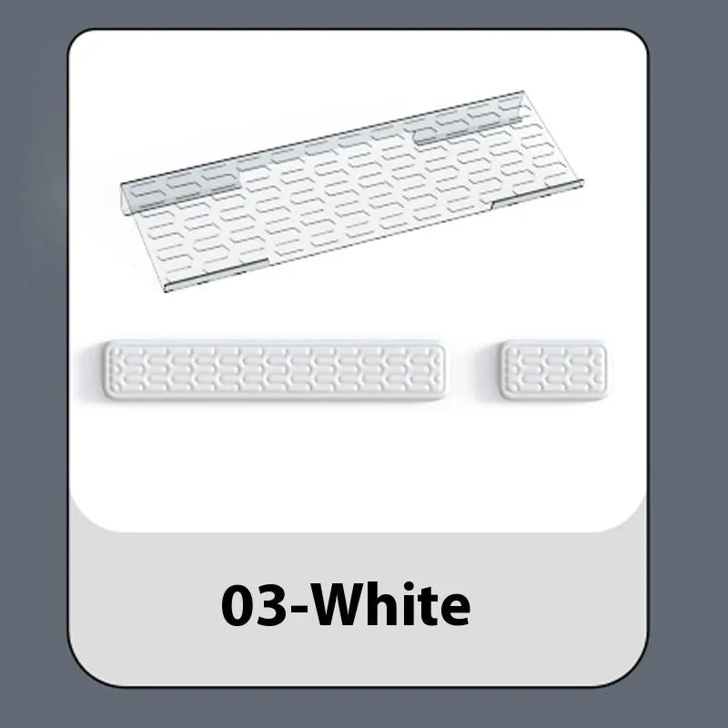 Double-sided black and grey keyboard mouse pad with wrist strap and hand pillow on a desk.
