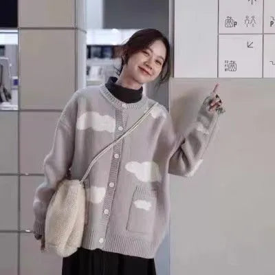 Blue cloud pattern women's spandex cardigan sweater with long sleeves and loose fit.