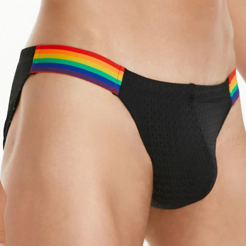 Men's black nylon mesh briefs with a low waist and multicoloured rainbow waistband