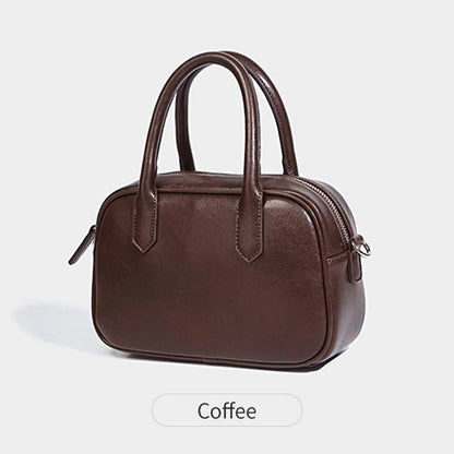 Small square retro messenger bag with single shoulder strap in black or coffee colour