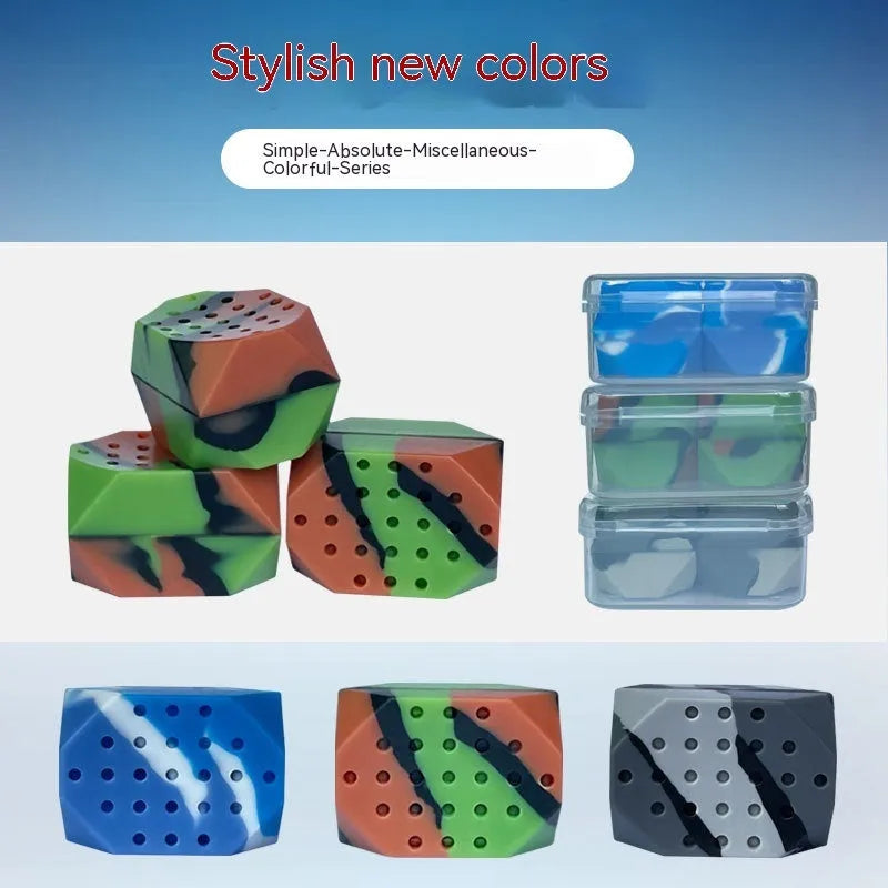 Two camouflage silicone facial muscle fitness balls for jaw training.