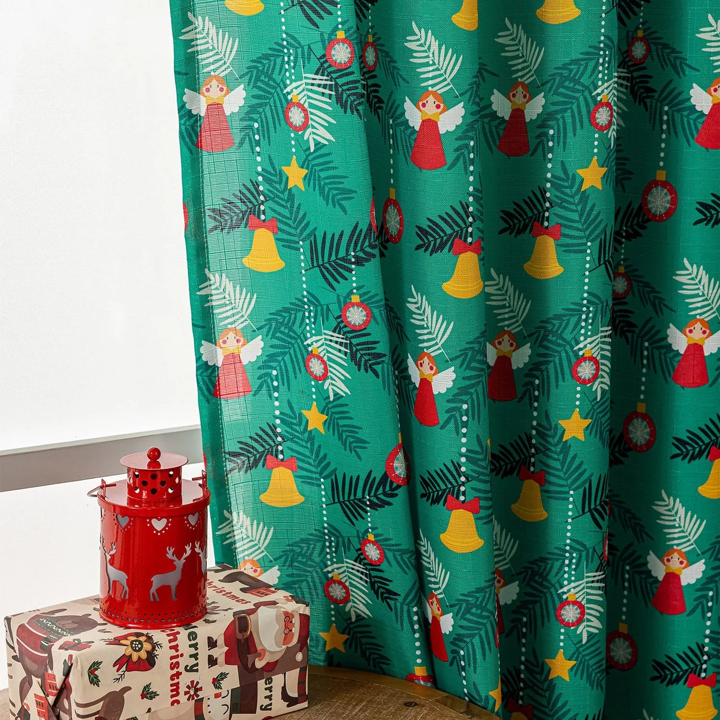 Christmas Snowman Angel Print Curtain showing festive cartoon pattern with 1 metre measurement and semi-sun shade function