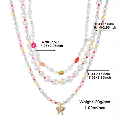 Elegant gold-plated necklace set featuring multi-row imitation pearl design, perfect for formal and casual wear