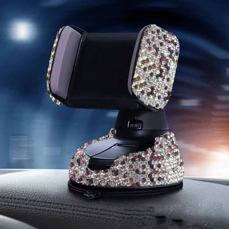 Diamond-encrusted car phone holder mounted on air vent with smartphone securely attached
