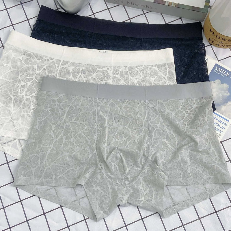 Men's thin lace leopard jacquard underwear in middle waist style, made from nylon, available in mysterious black, elegant white, high-grade grey, matcha green and light rice apricot, sizes L to 4XL (57.5kg to 102.5kg)