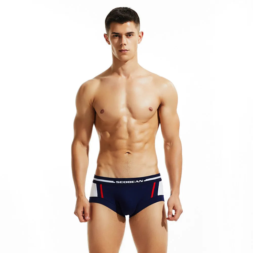 Men's cotton low waist boxer shorts in red, dark blue, and light grey colours.