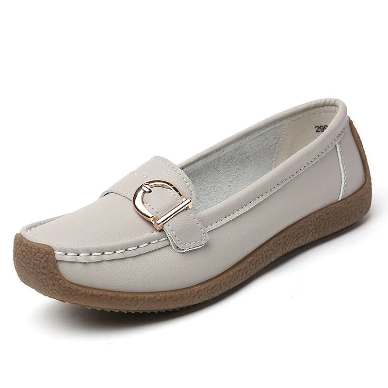 Women's beige casual loafers with a round toe and shallow-cut vamp on a beef tendon sole.