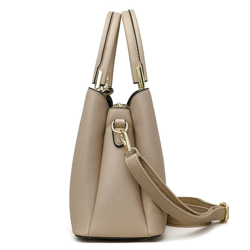 Black women's multi-layer PU leather shoulder messenger bag with sewing thread detail.