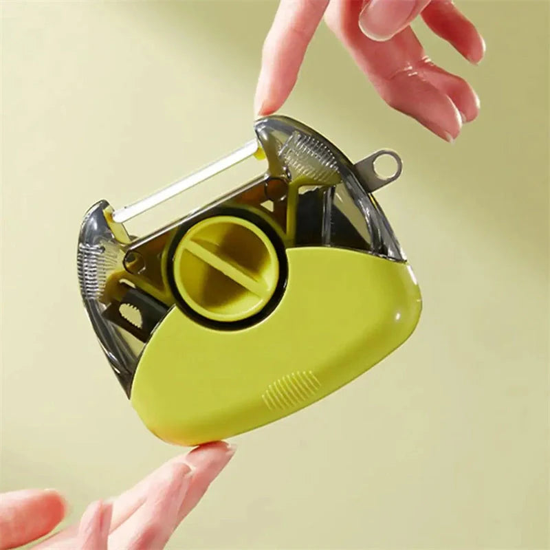 3-in-1 stainless steel peeler shredder with ergonomic handle for kitchen use