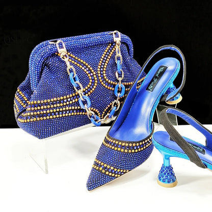 Women's pointed toe high heels with rhinestones and a matching small bag in blue.