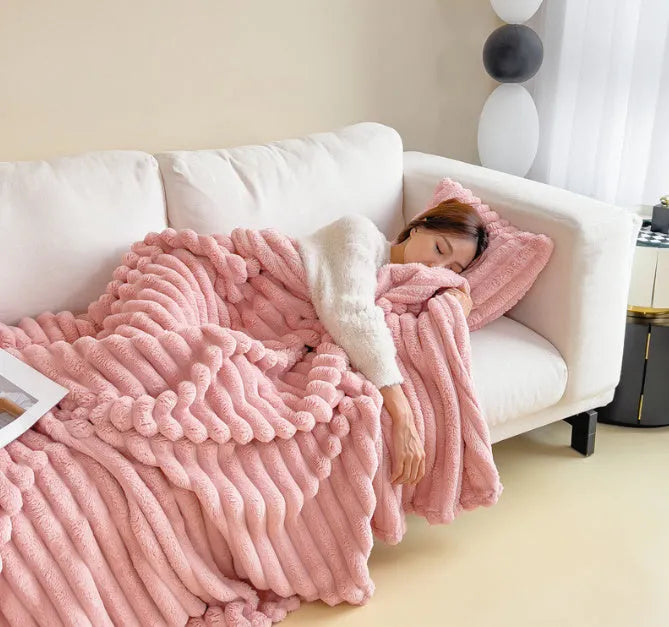 Double-sided bubble velvet faux rabbit fur blanket in a solid colour, shown folded.