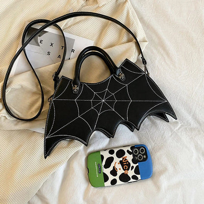 A stylish Halloween shoulder bag with a captivating spider web design, made of durable PU leather and offering ample storage space.