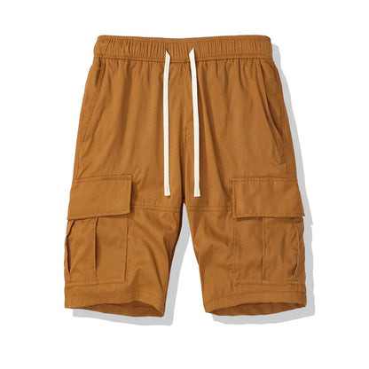 Men's loose cropped pants in Korean style with multiple pockets, shown in brick red colour