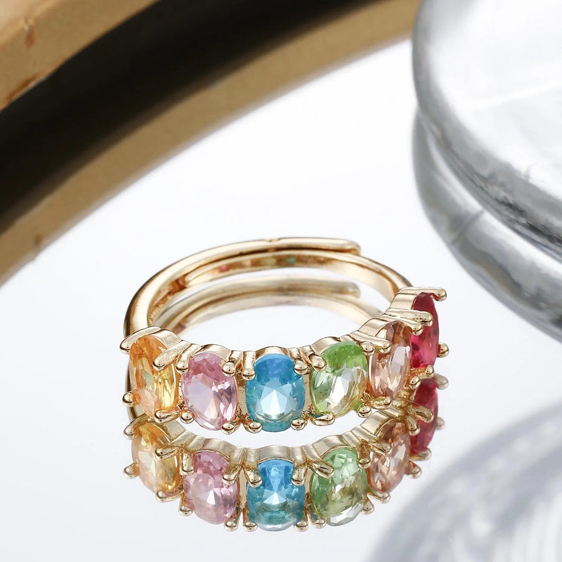 Adjustable gold-colour copper ring for women featuring simple retro zircon setting with European and American design style, electroplated jewellery for versatile everyday wear