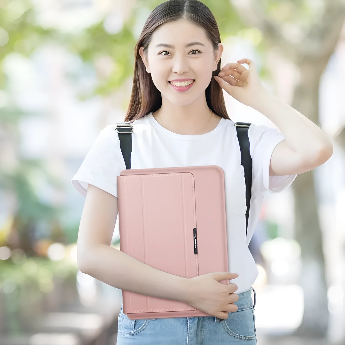 Three-in-one laptop bag in faux leather and plush, shown in black, dark blue, rose gold, grey, dark green, red or camel.