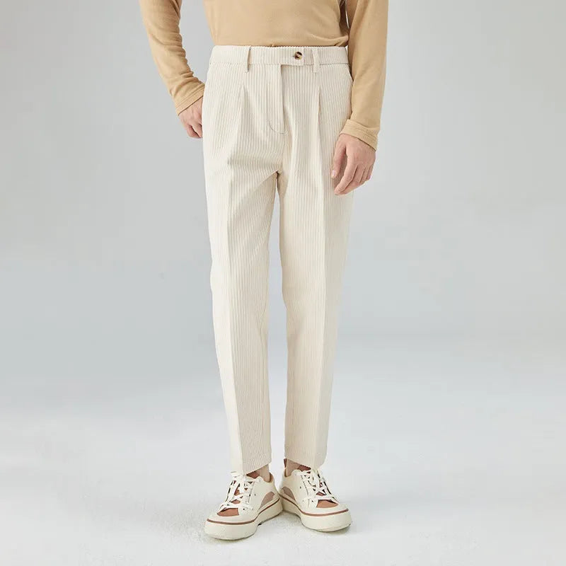 Men's straight-leg corduroy trousers in beige colour showing elastic waistband and loose fit