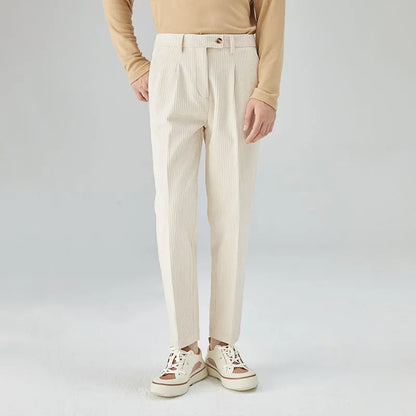 Men's straight-leg corduroy trousers in beige colour showing elastic waistband and loose fit