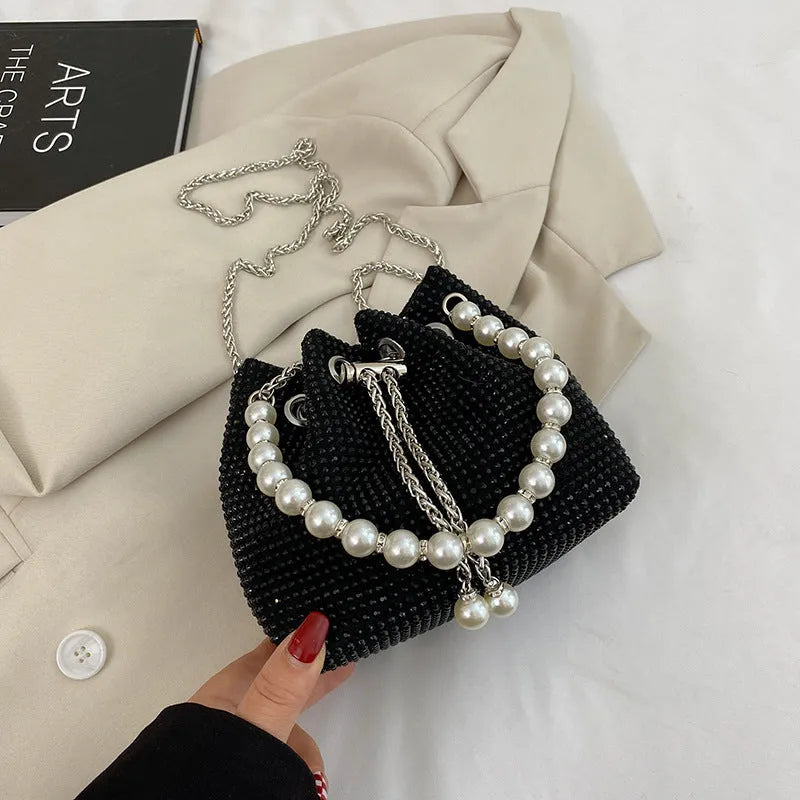 Diamond-patterned soft PU shoulder bag with detachable chain strap in bucket shape with internal organisers