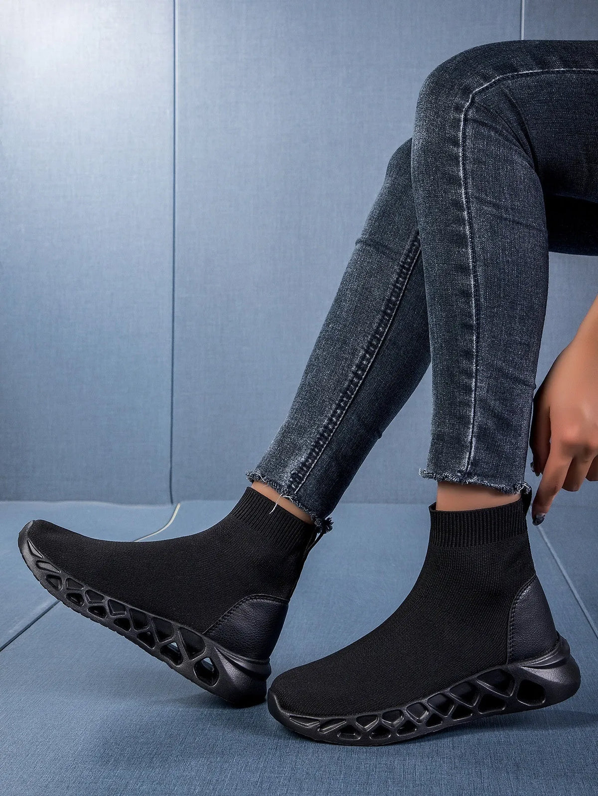 Women's casual mesh slip-on shoes in terracotta colour with flat sole and sewing line detail.