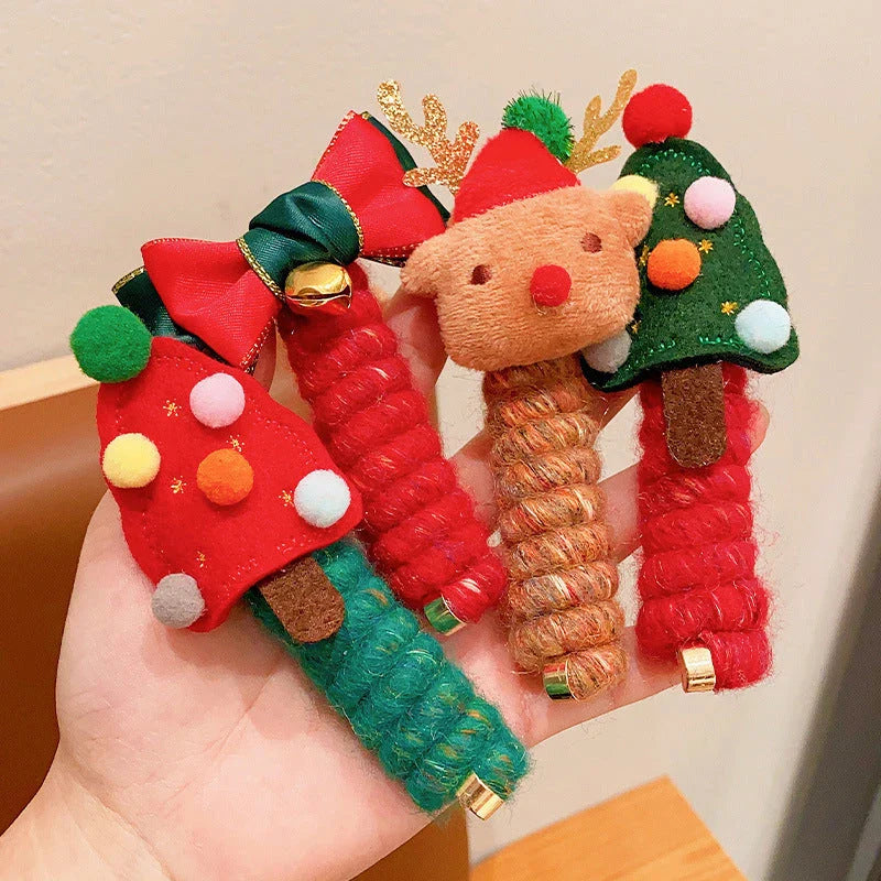 Festive Christmas-themed hair ties with cute designs like bells, trees, and reindeer for kids
