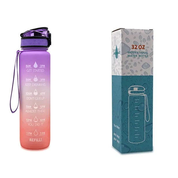 Blue and red gradient 1 litre Tritan sports water bottle with time markers and a flip-top lid.