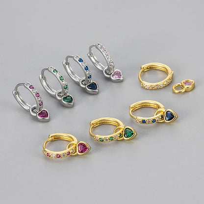 Women's fashion earrings with heart-shaped eardrops, diamond-treated gemstones in gold or white gold plating, approximately 2.5 cm long