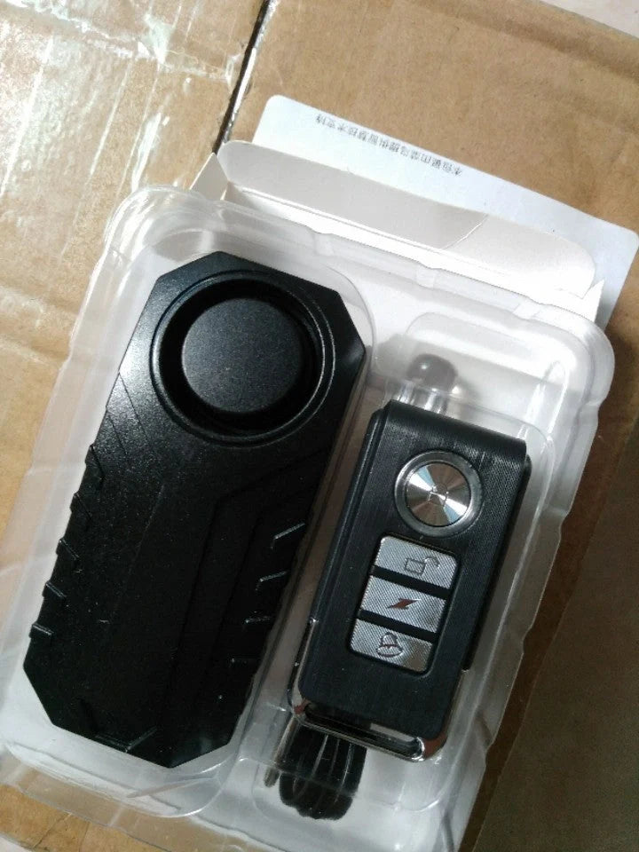 Electric vehicle remote alarm with black PC case and installation accessories