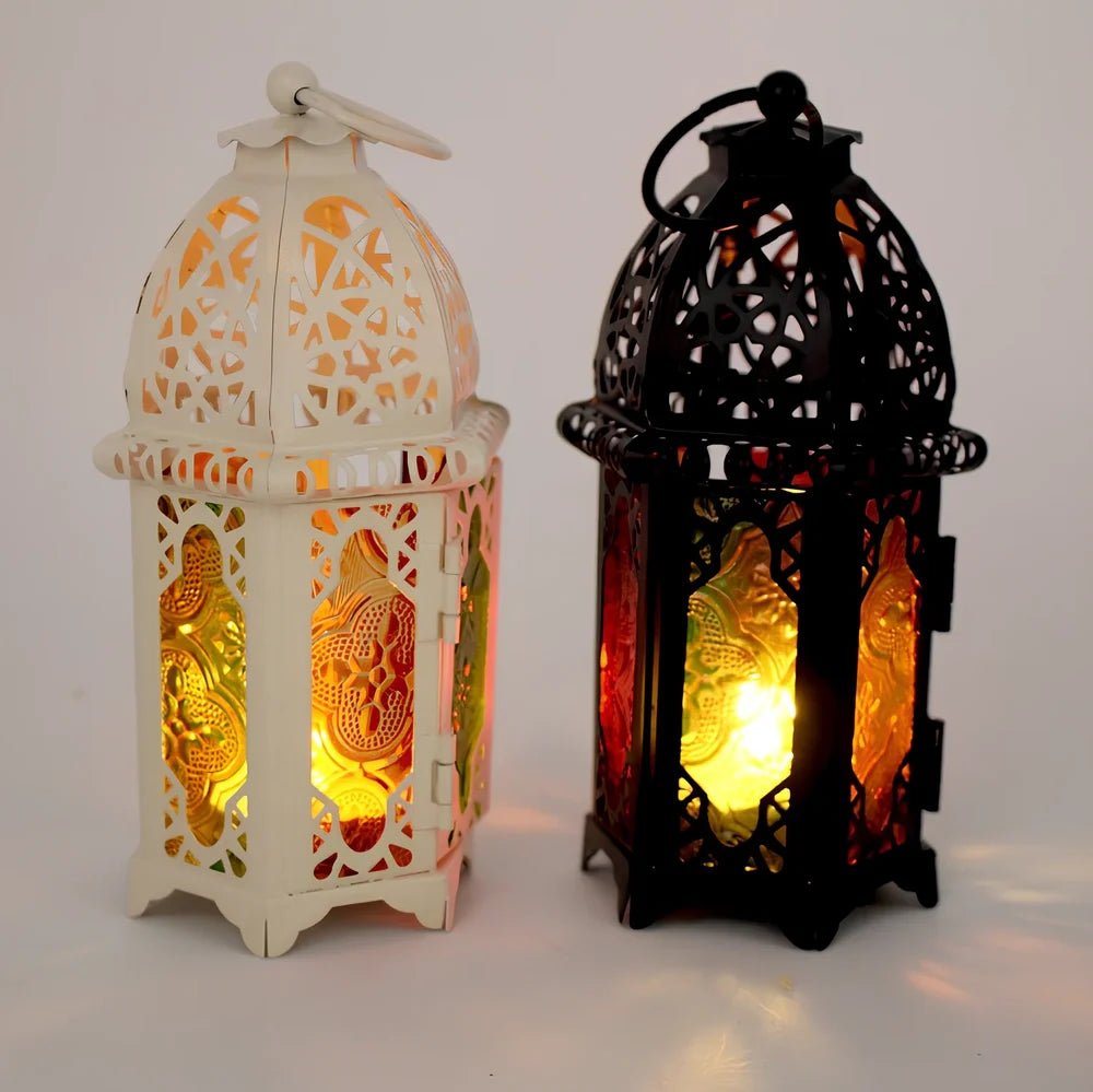 Wrought iron candle holder with 16cm height and 7cm diameter in black finish showing hanging design
