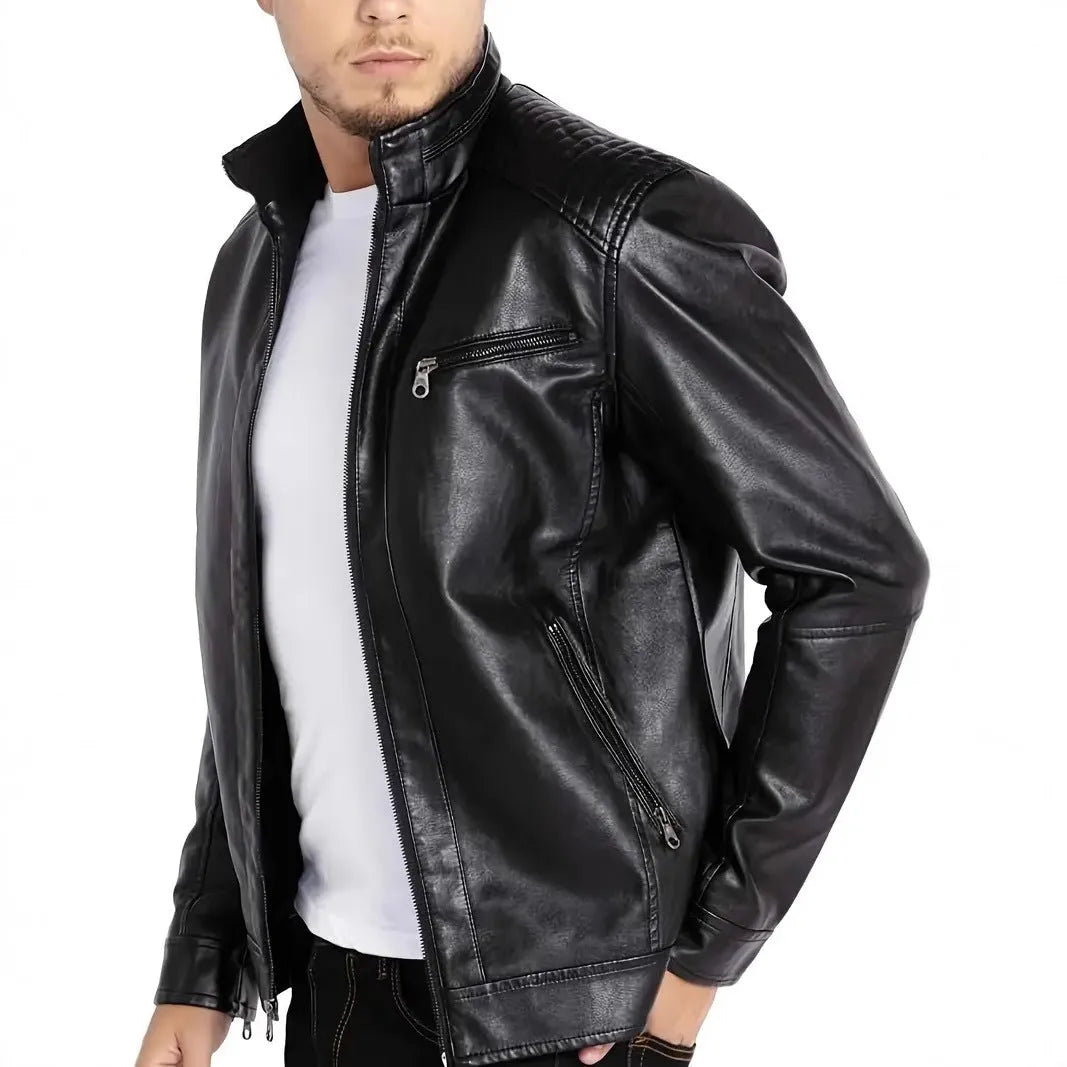 Men's brown artificial leather punk motorcycle jacket with a stand collar and straight hem on a grey background.