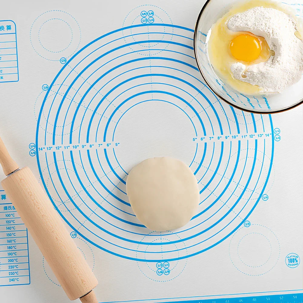 40x60cm black silicone baking mat with measurement guides on kitchen counter