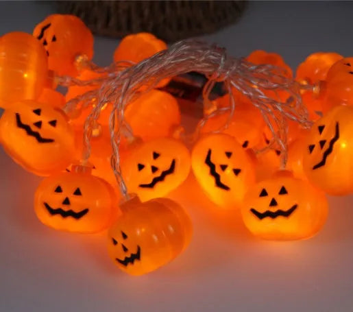 Halloween LED string lights with bat, ghost, and pumpkin pendants on a 1.2 metre white cable.