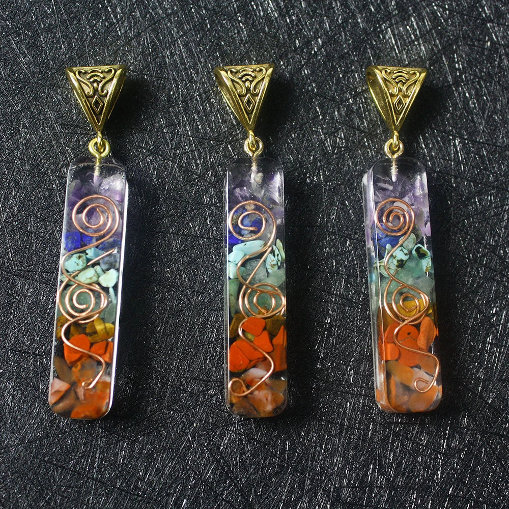 Handcrafted natural crystal seven chakra pendant with unique geometric design