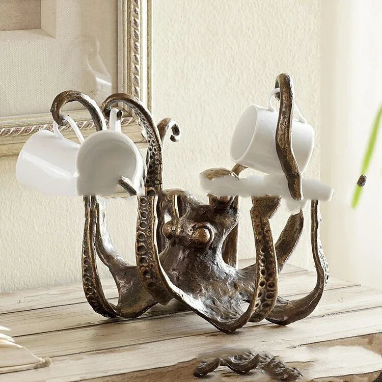 Decorative resin octopus tea cup holder with a lifelike design, perfect for adding a playful touch to your home or office decor