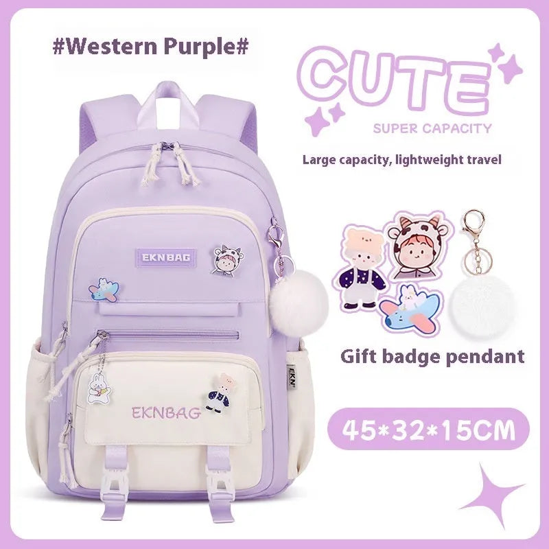 Pink waterproof school backpack for girls with curved ergonomic shoulder straps, shown with matching pencil case.